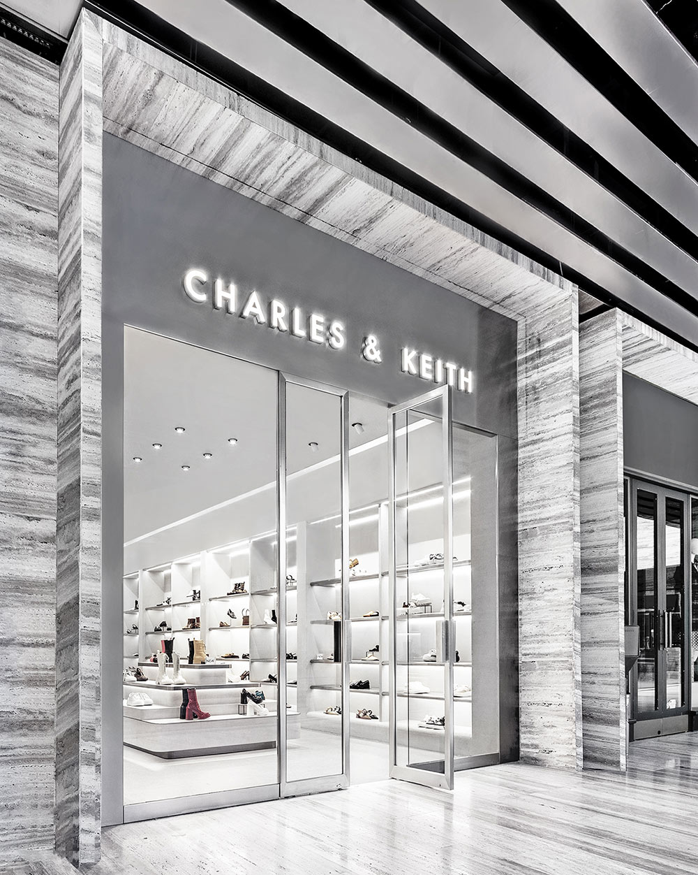 Interior view of CHARLES & KEITH store in Changi Airport. It was founded by brothers  Charles and Keith Wong. Dedicated to bringing trends to fashion-forward  consumers. Singapore - JAN 6, 2019. Stock